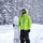 Men's 3-layer snowboard jacket and pants - neon green, on-model front with upright snowboard, for skiing and snowboarding