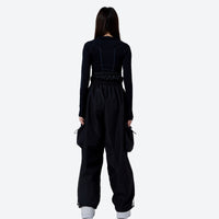 
                  
                    Unisex asymmetric snowboard jacket and cargo pants - black snow pants with black top, for powder days and winter commute
                  
                