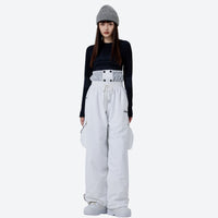 
                  
                    Unisex waterproof 2L asymmetric snow jacket - white snow pants with black top, for resort and street wear
                  
                