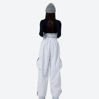 
                  
                    Unisex asymmetric snowboard jacket and cargo pants - white snow pants with black top, for cold-weather winter sports
                  
                