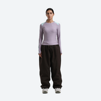 
                  
                    Women's waterproof 2L snow jacket and pants - lavender base layer top with black snow pants, for resort and street wear
                  
                