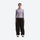 Women's waterproof 2L snow jacket and pants - lavender base layer top with black snow pants, for resort and street wear