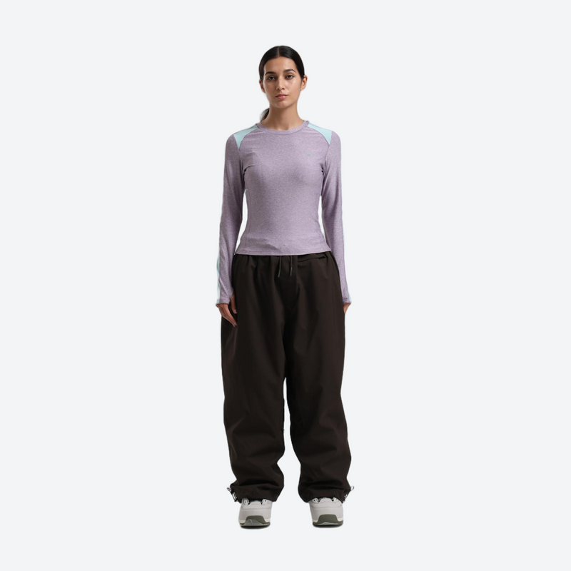 Women's waterproof 2L snow jacket and pants - lavender base layer top with black snow pants, for resort and street wear