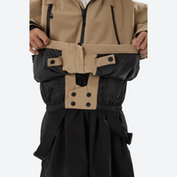 
                  
                    Youth 3-layer ski suit with bib pants - tan jacket with black pants, reinforced knee and seat patches
                  
                