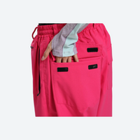 
                  
                    Women's breathable ski jacket set - rose red snow pants, back pocket close-up with hand, for resort and street wear
                  
                