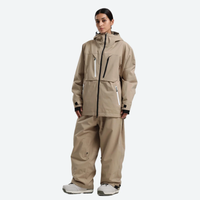 
                  
                    Women's breathable ski jacket with chest zip pockets - tan jacket with tan pants, for resort and street wear
                  
                