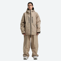 
                  
                    Women's waterproof 2L snow jacket and pants - tan jacket with tan pants, for skiing and snowboarding
                  
                