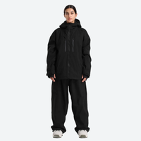 
                  
                    Women's breathable ski jacket with chest zip pockets - black jacket with black pants, for skiing and snowboarding
                  
                