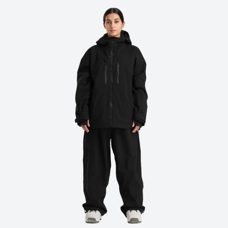 Women's breathable ski jacket with chest zip pockets - black jacket with black pants, for skiing and snowboarding