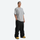 Men's breathable 2L snowboard jacket and pants - black snow pants, on-model front view, for powder days and winter commute