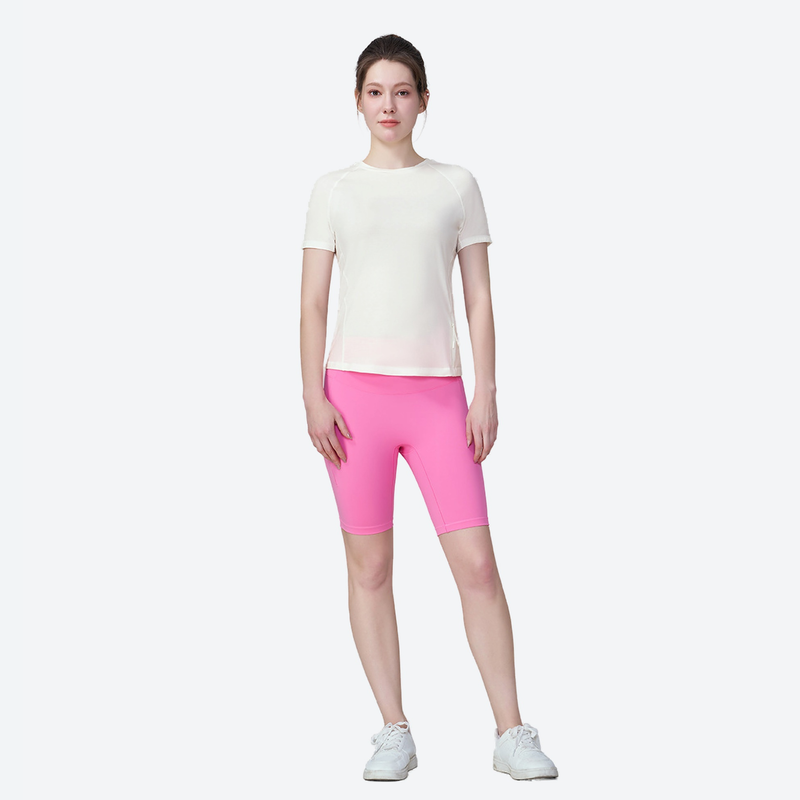 Women's seamless merino wool base layer top - cream merino wool quick-dry tee with pink shorts, for hiking and trail walking