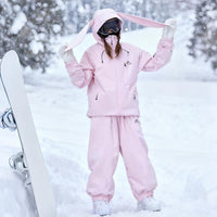 
                  
                    Women's quilted lining ski jacket with suspender bibs - light pink jacket with light pink pants, for skiing and snowboarding
                  
                