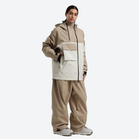 
                  
                    Women's breathable 2-layer snowboard jacket and pants - tan and cream colorblock jacket with tan pants
                  
                
