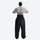 Men's waterproof 2L pullover snow jacket and pants - black snow pants, on-model back view, for cold-weather winter sports