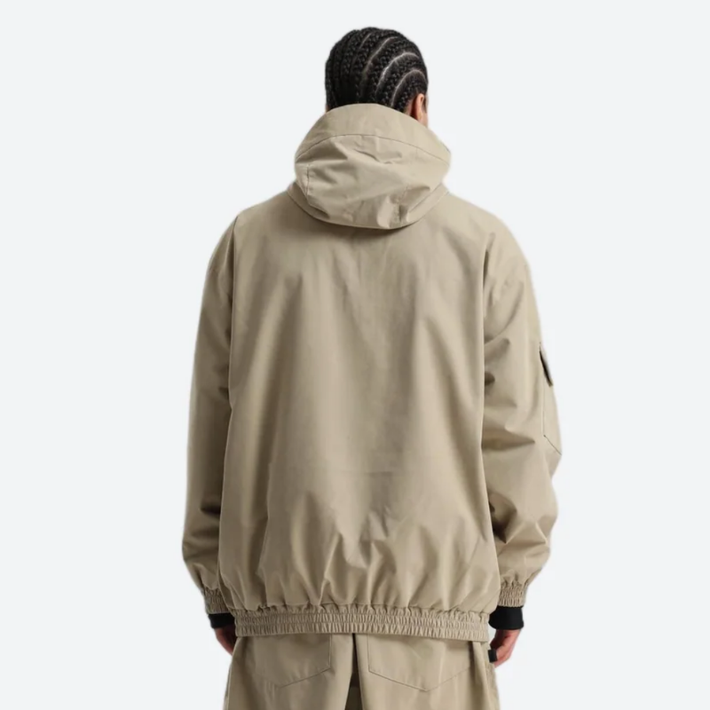 Breathable 3-layer ski pullover with balloon pants - tan jacket, on-model back view, for skiing and snowboarding