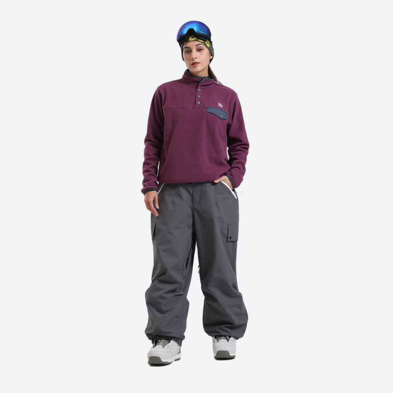 3-layer snowboard cargo pants - gray snow pants with purple pullover, on-model front view, for cold-weather winter sports