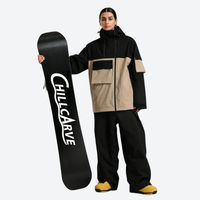 
                  
                    Women's waterproof 2L snow jacket and pants - black and tan colorblock jacket with black pants, for resort and street wear
                  
                