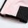 Women's one-piece snowboard suit with waist belt - pink, hem colorblock close-up detail, for cold-weather winter sports