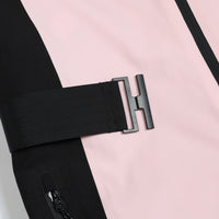 
                  
                    Women's waterproof one-piece snow suit - pink, waist belt strap and buckle close-up detail, for powder and piste riding
                  
                