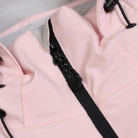 
                  
                    Women's breathable colorblock jumpsuit ski suit - pink, collar zip close-up detail, for powder and piste riding
                  
                