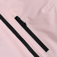 
                  
                    Women's one-piece snowboard suit with waist belt - pink, thigh zip pocket close-up detail, for powder and piste riding
                  
                