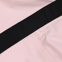 
                  
                    Women's one-piece snowboard suit with waist belt - pink, colorblock panel close-up detail, for resort and backcountry days
                  
                