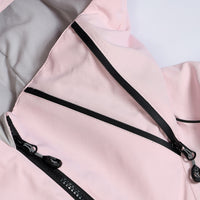 
                  
                    Unisex waterproof one-piece snow suit - pink one-piece suit, chest zip close-up detail, for resort and backcountry days
                  
                