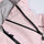 Unisex waterproof one-piece snow suit - pink one-piece suit, chest zip close-up detail, for resort and backcountry days