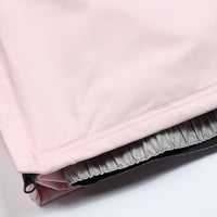 
                  
                    Unisex waterproof one-piece snow suit - pink one-piece suit, hem snow gaiter close-up detail, for skiing and snowboarding
                  
                