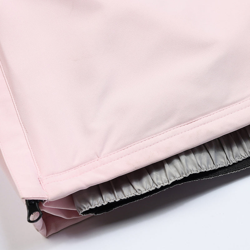 Unisex waterproof one-piece snow suit - pink one-piece suit, hem snow gaiter close-up detail, for skiing and snowboarding