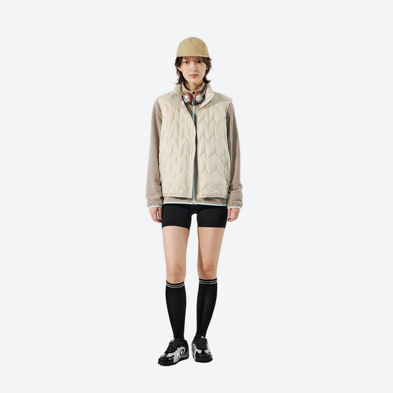 Unisex ultralight packable down vest and jacket - cream white ultralight down vest on women with beanie