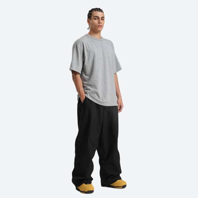 Men's 2-layer snowboard jacket and pants - black snow pants with gray tee, for powder days and winter commute