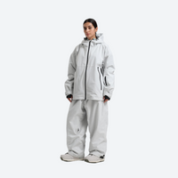 
                  
                    Women's 2-layer snowboard jacket and pants - light gray jacket with light gray pants, for powder days and winter commute
                  
                