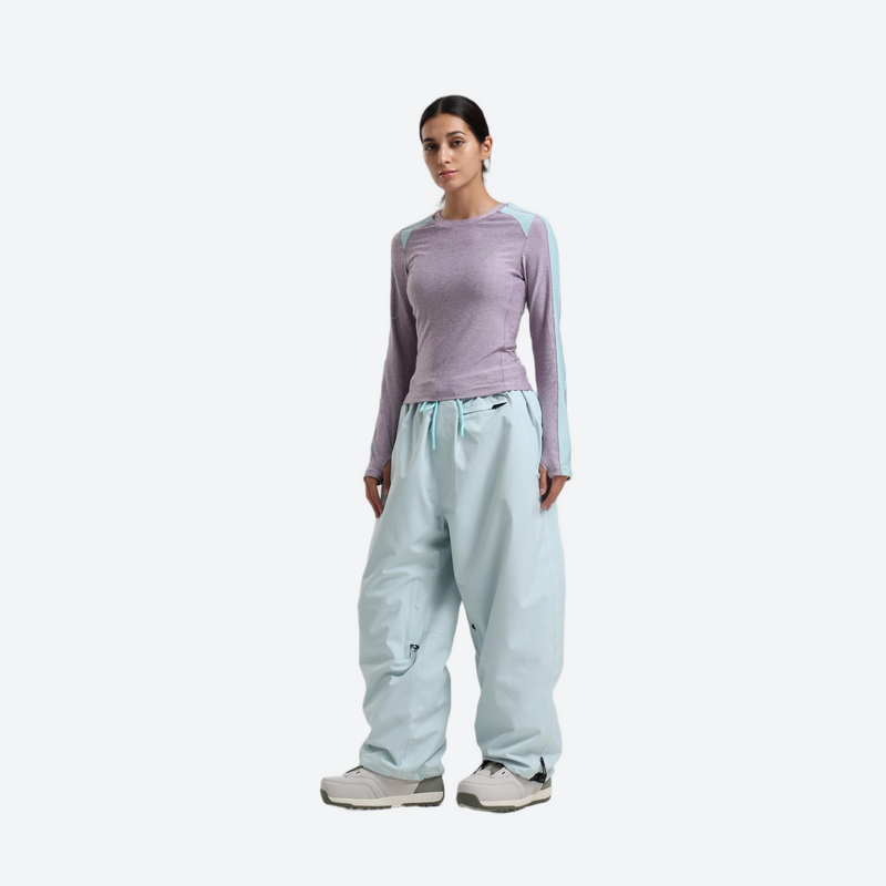 Women's waterproof 2L snow jacket and pants - lavender base layer top with mint snow pants, for cold-weather winter sports