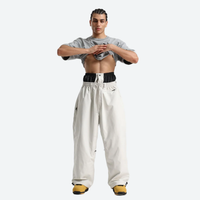 
                  
                    Breathable 3-layer ski pullover with balloon pants - white snow pants, for powder days and winter commute
                  
                