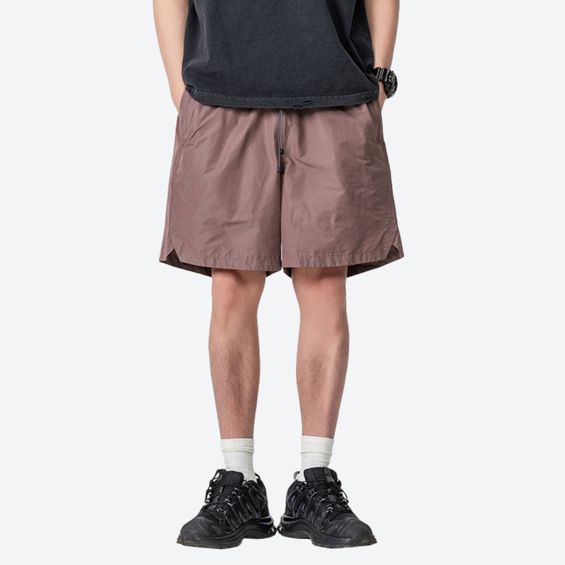 Breathable lightweight trail shorts - coffee brown quick-dry shorts with black tee, for warm-weather trekking