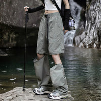 
                  
                    Women's quick-dry trail pants converting to shorts - gray zip-off hiking pants with black top, for warm-weather trekking
                  
                