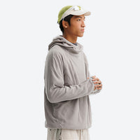
                  
                    Wrinkle-resistant hooded mid-layer with thumb cuffs - light gray hooded mid-layer pullover on men with cap
                  
                