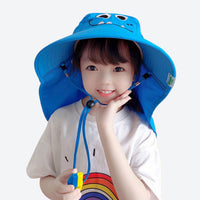 
                  
                    Bubble kids sun hat UPF50 with detachable neck flap - blue kids sun hat on girl, worn front view, for travel and city walks
                  
                