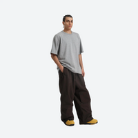 
                  
                    Men's 2-layer snowboard jacket and wide-leg pants - coffee brown snow pants with gray tee, for powder days and winter commute
                  
                