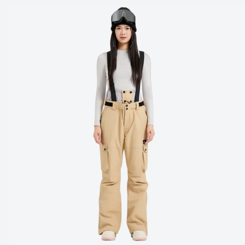 Women's breathable ski jacket with suspender pants - tan snow pants, on-model front view, for skiing and snowboarding