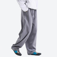 
                  
                    Women's knit cargo hiking pants with relaxed fit - gray knit cargo pants with white top, for warm-weather trekking
                  
                
