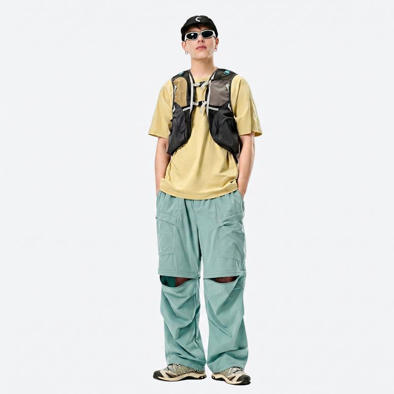 Unisex Coolmax zip-off hiking pants with UPF50 - mint zip-off hiking pants with yellow tee, for sunny-weather trekking