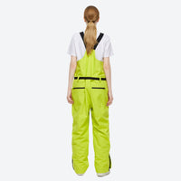 
                  
                    Unisex colorblock snowboard jacket and bibs - lime green bib pants, on-model back view, for skiing and snowboarding
                  
                