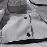 
                  
                    Women's waterproof 2L snow jacket and pants set - lavender, pocket snap close-up detail, for powder days and winter commute
                  
                