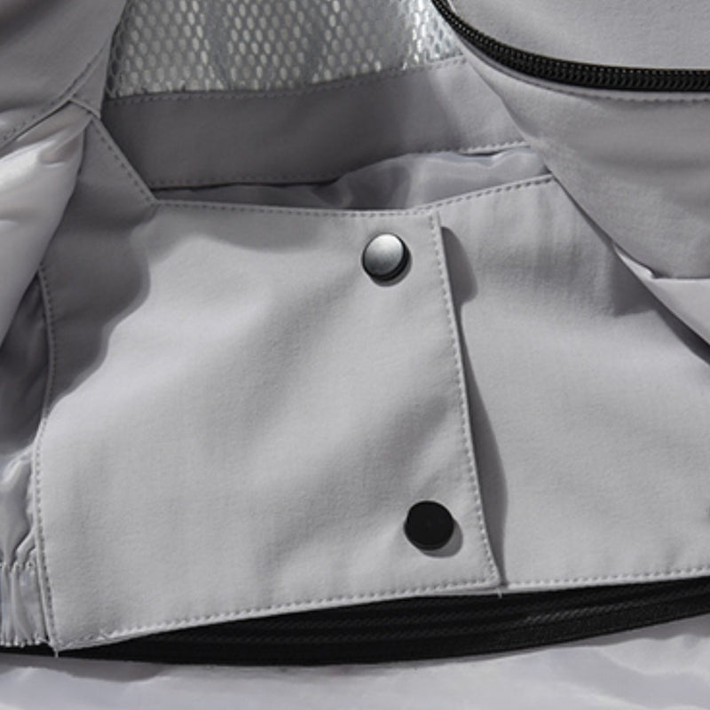 Women's waterproof 2L snow jacket and pants set - lavender, pocket snap close-up detail, for powder days and winter commute