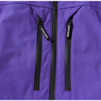 
                  
                    Unisex colorblock snowboard jacket and bibs - purple, chest zip close-up detail, for skiing and snowboarding
                  
                