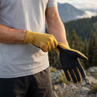 
                  
                    Merino wool full finger and half finger hiking gloves - mustard merino wool hiking gloves on men, glove on-off close-up
                  
                