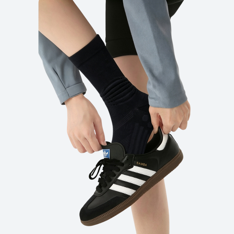 Breathable ergonomic merino wool socks - black merino wool socks on feet with shoes, for hiking and trail walking