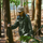 Stain-proof hooded sun jacket for outdoor - olive waterproof sun jacket on men with cap, for hiking and trail walking